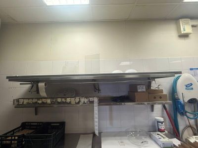 an image of a kitchen with a sink and a stove