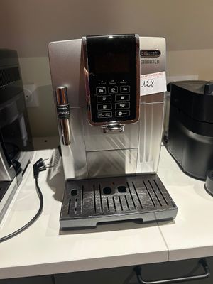 a coffee machine that is sitting on a table