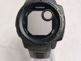 a close up of a smart watch on a clear stand