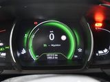 the dashboard of a car with a digital display on it ' s dashboard