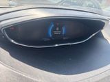 the dashboard of a car with a digital display on it