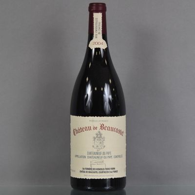 a bottle of wine that is sitting on a table