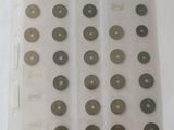 a lot of different types of coins on the table