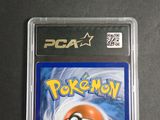 a close up of a nintendo game case with a pokemon ball on it