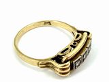 a close up of a gold ring with diamonds on a white background