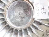 a silver plate that has a note on it