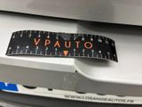 a sticker that says vauto on the front of a car