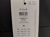 the label is attached to the back of a black jacket