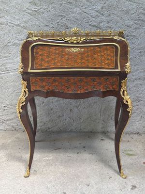 an image of a small table with a drawer on top of it