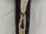 painting of a crucif cross with jesus on it on a white cloth