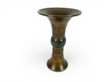 an image of a bronze vase on a white background