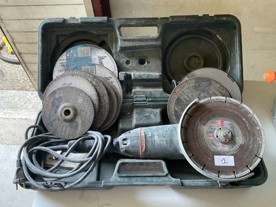 a box with a bunch of tools on a table