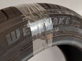 a close up of a tire with a sticker on it
