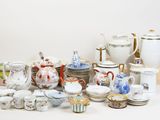 many different types of tea and coffee cups and saucers