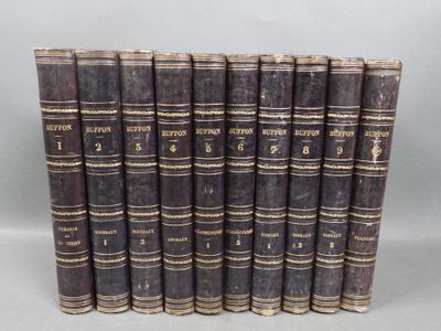 a set of six old books sitting on top of each other