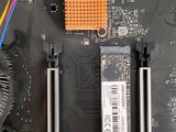 a close up of a computer motherboard with wires attached to it