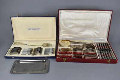 a case with silverware in it and a tray with silverware in it