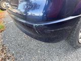 a close up of a car ' s rear bumper