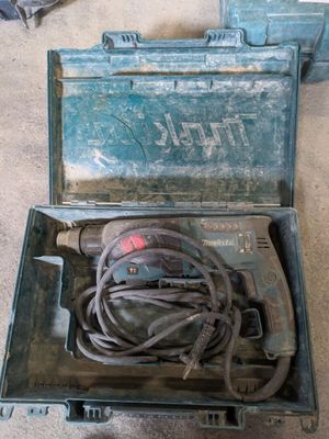 a tool in a case that is sitting on the floor