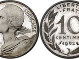 a close up of a coin with a woman ' s face on it