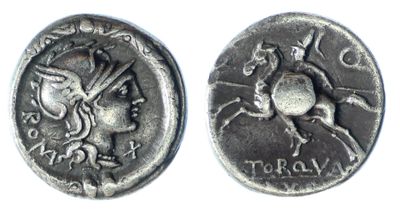a silver coin with a horse and rider on it
