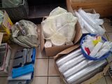 many items that are sitting on the floor in the room