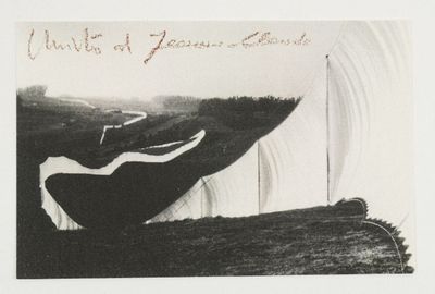 a black and white photo of a boat in the water
