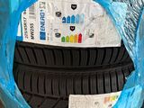 a pile of tires wrapped in plastic on the ground