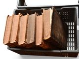 a basket that has a bunch of books inside of it