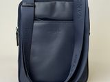 the small cross body bag in navy blue leather