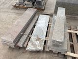 a pile of concrete blocks sitting on a pallet