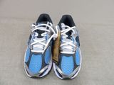 pair of blue and black running shoes with white laces on them