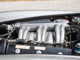 a close up of a car ' s engine with its hood open