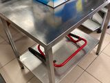 a box of soda sitting on a table in the kitchen