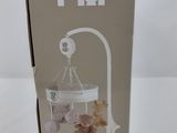 a box with a picture of a baby ' s crib in it