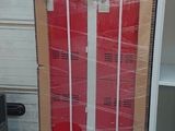 a red fire hydrant that is in the middle of a pallet