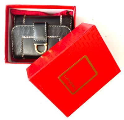 a red box with a black wallet inside of it