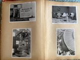 an open book with pictures of people and a satellite on it