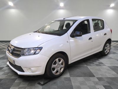 a picture of a white car parked in a garage