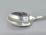 a spoon that is sitting on a table