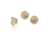 a set of three gold and mother of pearl rings