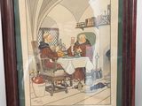 photo encadrée représentant un couple assis à une table devant une cheminée