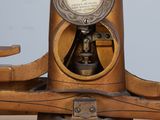 a clock that is on top of a wooden table