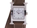 an image of a close up of a watch on a white background