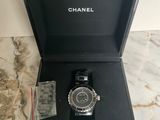 chanel watch in a box with a watch in it