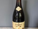 a bottle of wine that is sitting on a table