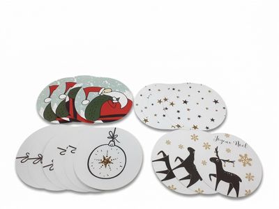 quatre sous-verres présentant différents motifs et dessins sur fond blanc