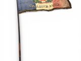 flag of the state of west virginia on a wooden stick