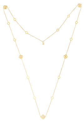 un collier en or composé d'une longue chaîne ornée d'un motif floral