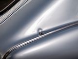 a close up of a car ' s hood and window